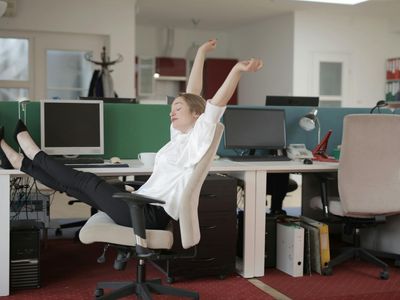 Man stretching gently in the office